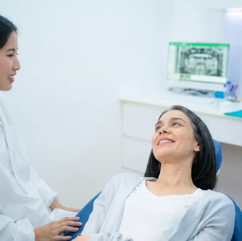 A smiling mid-age patient